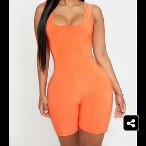 Orange jumpsuit from pretty little thing